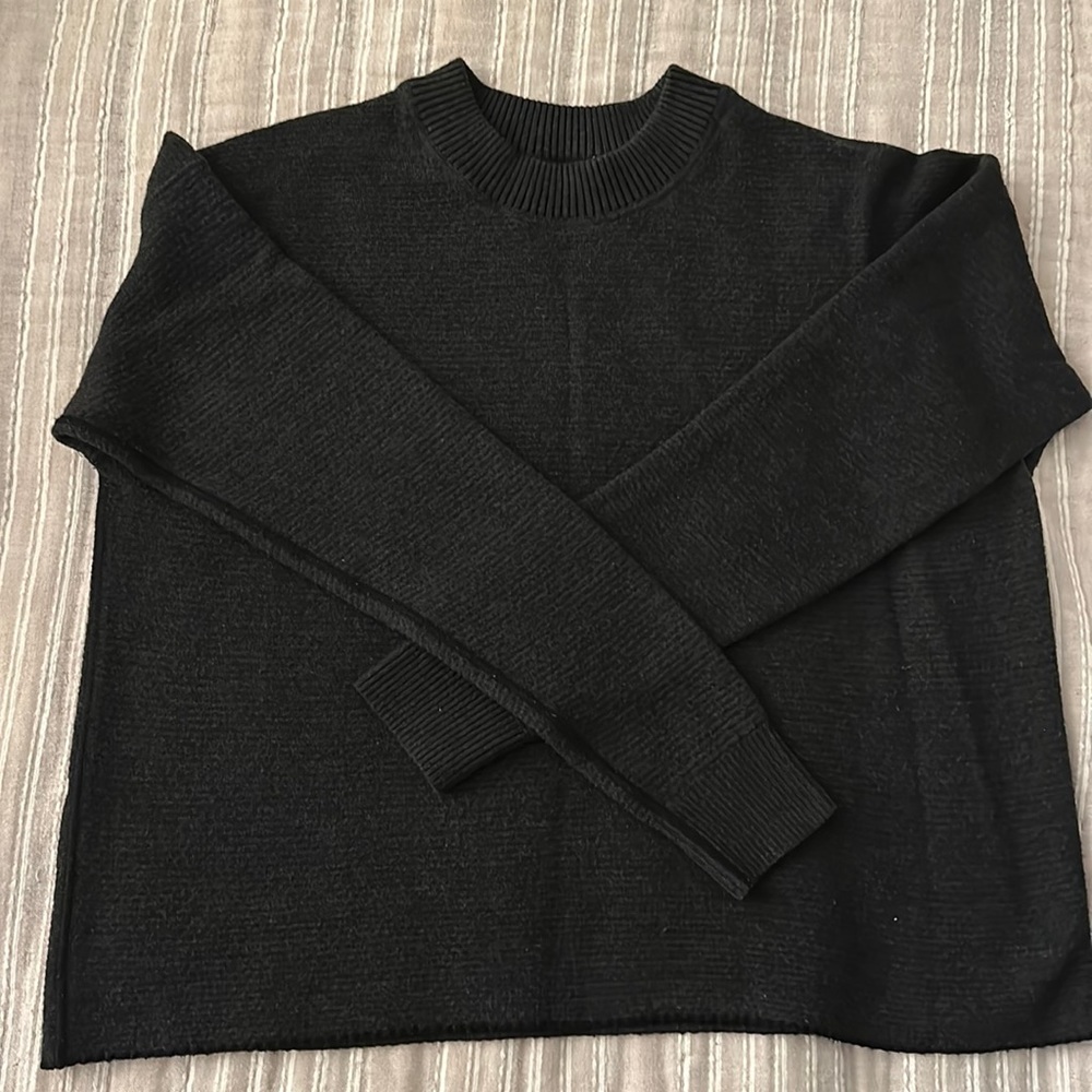 Reversible double knit crew neck sweater. Size 10 . color black and grey